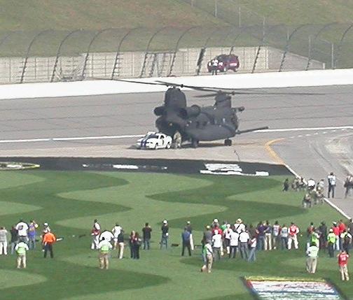 chopper3.jpg - US Armys MH-47E Special Operations Aircraft (SOA) delivering the Ford Mustang Pacecar